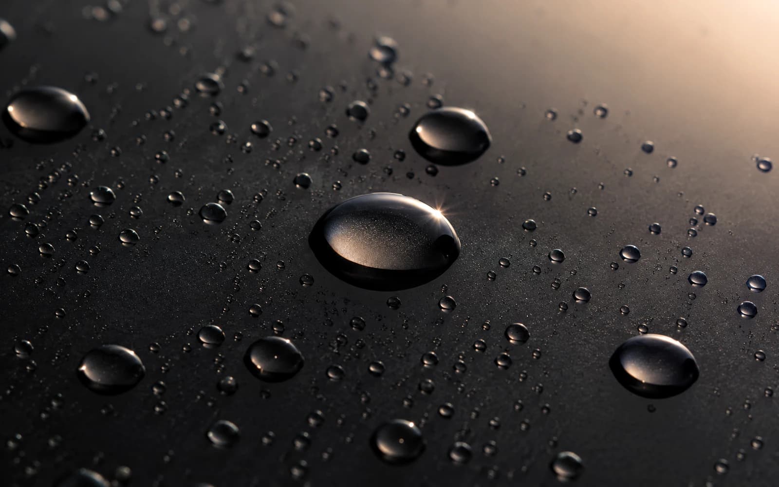 Illustration temporaire: Gouttes d'eau perlées évoquant une protection céramique