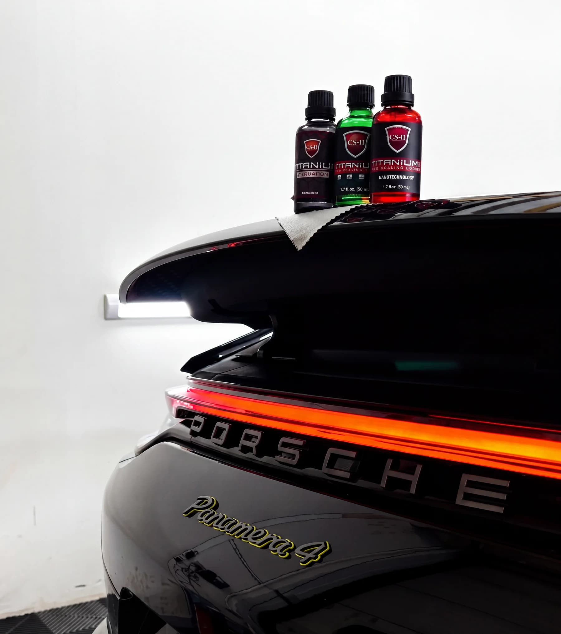 Produits de protection céramique présentés sur une Porsche chez ISA